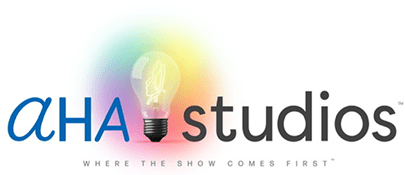 A colorful logo of a light bulb with the text 'studio' beside it.