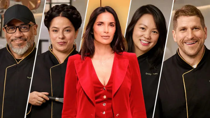 Three women chefs posing together, one in a striking red outfit.